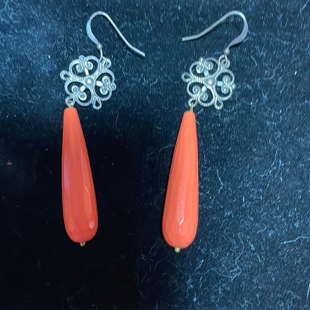 Orange earrings for Easter. Appear to be carrot-like.